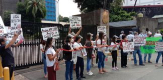 Families of distressed and stranded OFWS troop to the DFA to demand urgent repatriation, welfare and legal assistance during day of Senate Budget Hearing of DFA